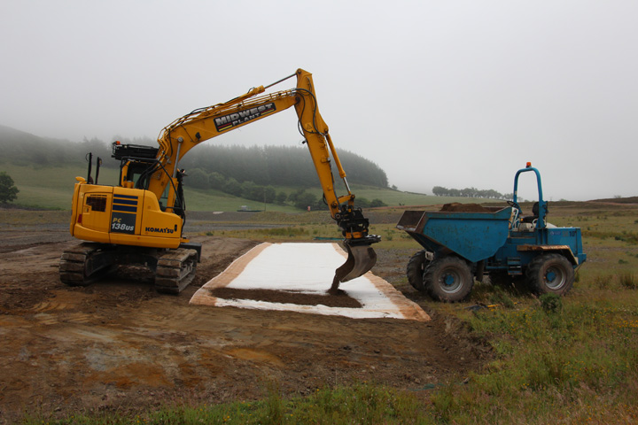 Laying geosynthetic clay liner (GCL)